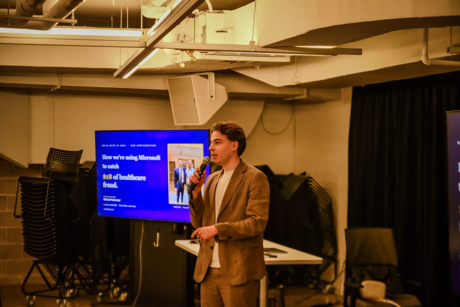 Michael Pavlovskyi speaking on AI for professional services at Northwestern University